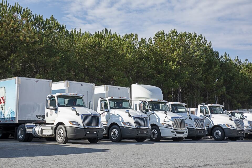 Fleet of White Trucks