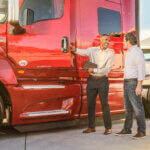 Semi Truck Service & Truck Owner talking